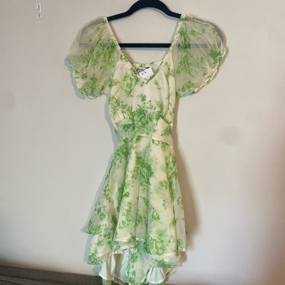 Chiffon tie back romper in green floral